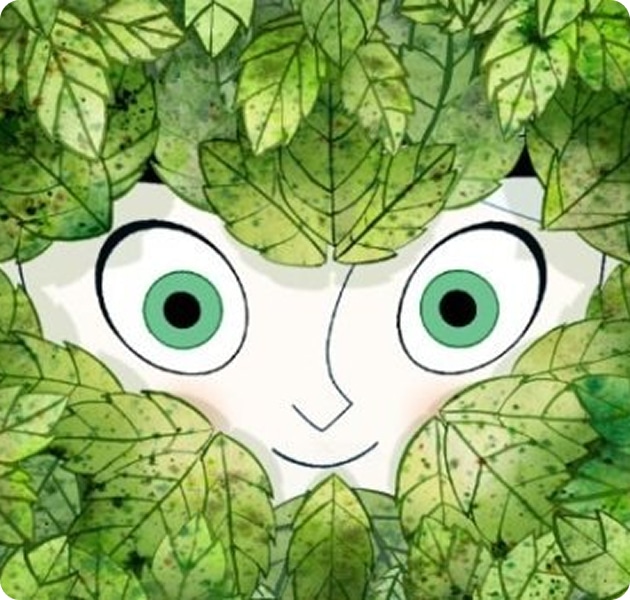 A cartoon face with wide green eyes and a smile peeps out from behind a dense cluster of green leaves, capturing the playful spirit seen at About Kilkenny Animated Festival.