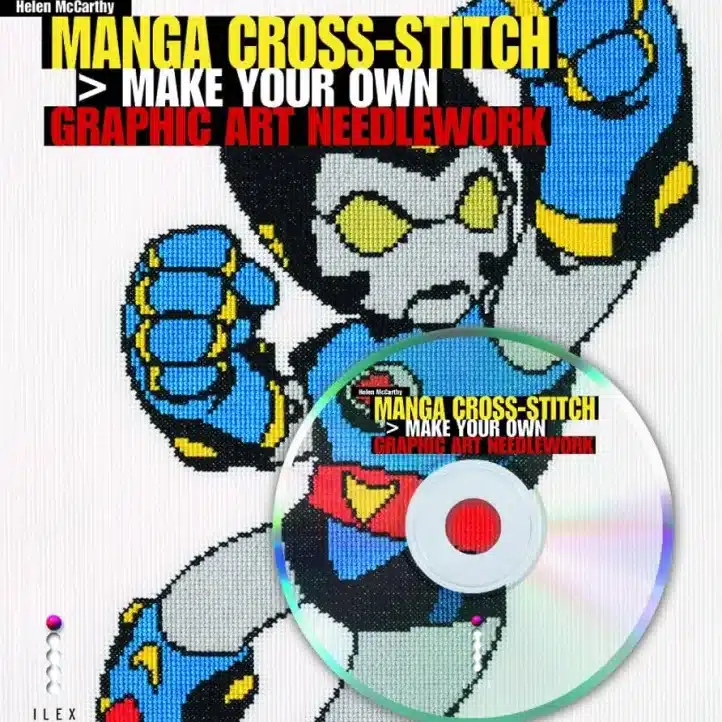 Cover of "Manga Cross-Stitch: Make Your Own Graphic Art Needlework," featuring a pixelated robot in blue, black, and yellow, with a CD partially covering the image.
