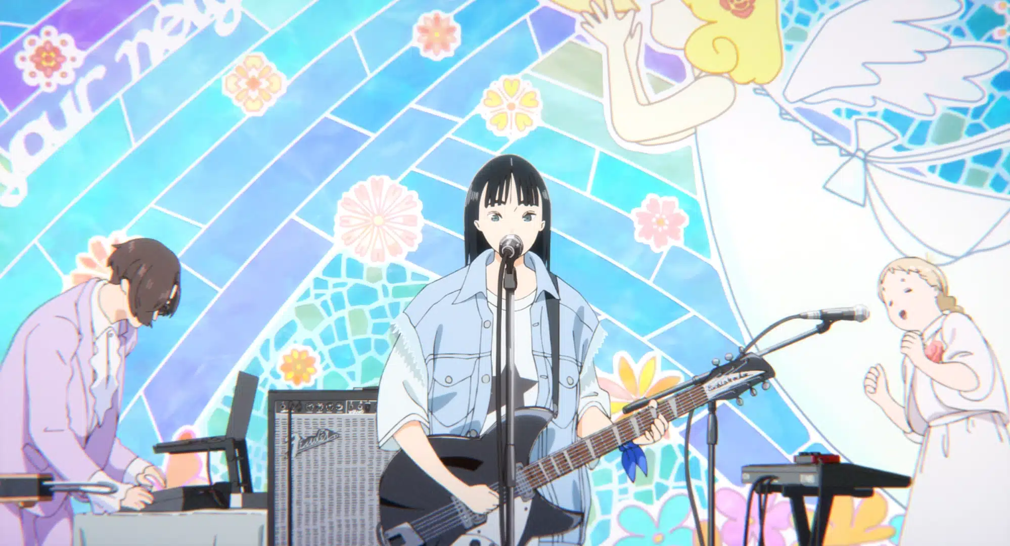 Animated girl playing electric guitar and singing into a microphone on stage, with a bandmate on keyboard behind her. Colourful stained glass-style mural with angels and flowers decorates the background.
