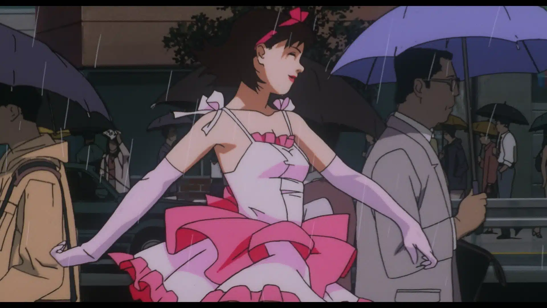 An animated girl in a pink and white dress twirls joyfully in the rain, surrounded by people holding umbrellas on a city street.