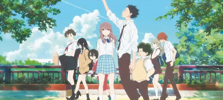 A group of seven anime students in school uniforms stand on a sunlit bridge with green trees and a blue sky in the background. One boy reaches upwards while others stand or walk nearby, some looking at the camera.